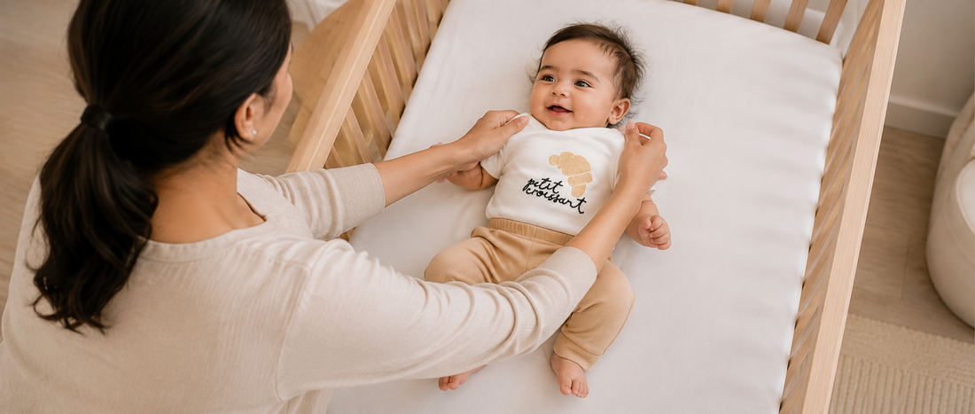 Babyron pyjama set petite croissant made to wear by mother trying to figure out the need to buy new clothes as the baby grows in size 