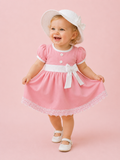 Blush Pink — BabyRon Princess organic cotton baby dress worn by baby model, soft cotton baby clothes for sensitive skin, premium baby clothes India and sustainable baby clothing India by BabyRon