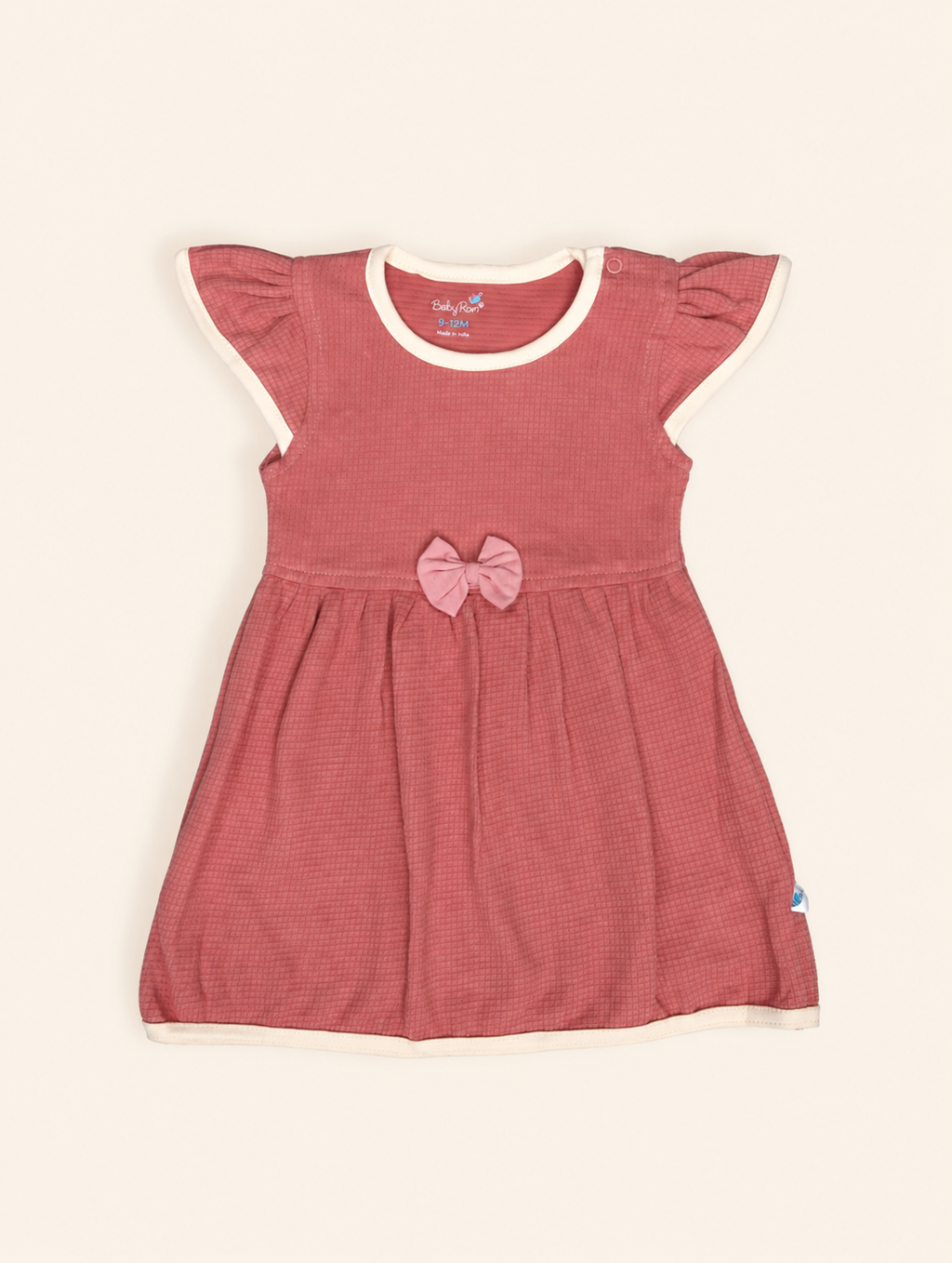 Desert Rose — BabyRon Duchess organic cotton baby dress worn by baby model, soft cotton baby clothes for sensitive skin, premium baby clothes India and sustainable baby clothing India by BabyRon