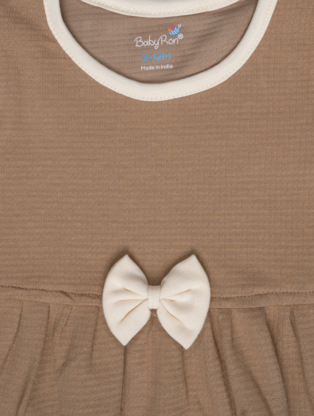 Mocha Mist — BabyRon Duchess organic cotton baby dress worn by baby model, soft cotton baby clothes for sensitive skin, premium baby clothes India and sustainable baby clothing India by BabyRon
