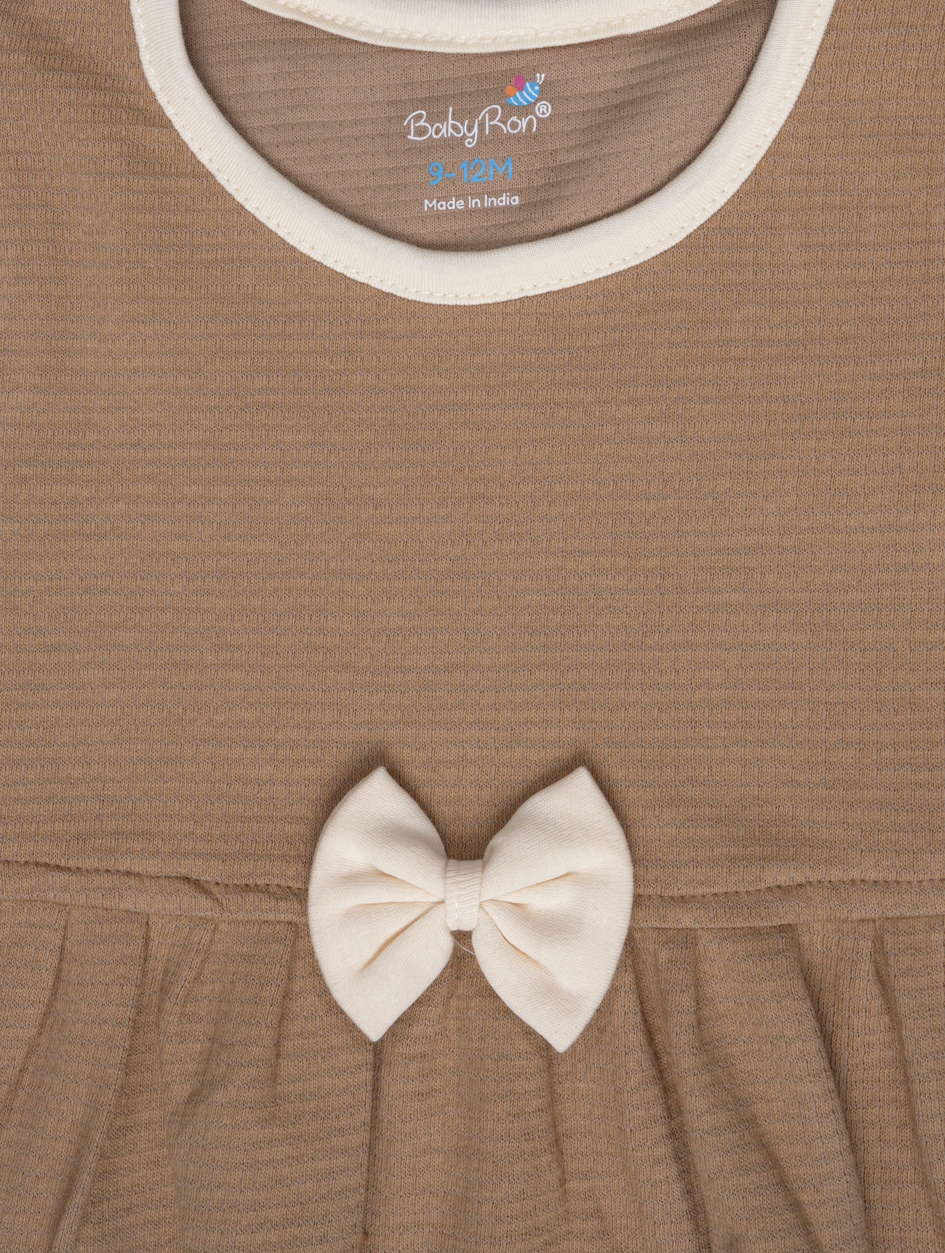 Mocha Mist — BabyRon Duchess organic cotton baby dress worn by baby model, soft cotton baby clothes for sensitive skin, premium baby clothes India and sustainable baby clothing India by BabyRon