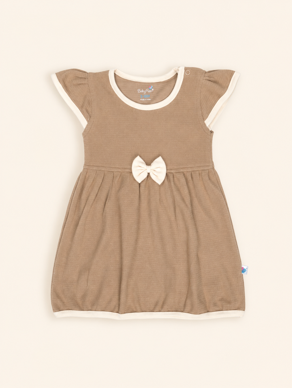 Mocha Mist — BabyRon Duchess organic cotton baby dress worn by baby model, soft cotton baby clothes for sensitive skin, premium baby clothes India and sustainable baby clothing India by BabyRon