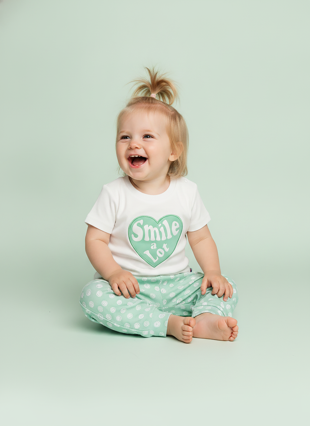 Pistachio Green — BabyRon Smile premium organic cotton baby pyjama set worn by baby girl model, soft breathable baby wear for 0–12 months, gentle on sensitive skin, premium baby clothing India by BabyRon