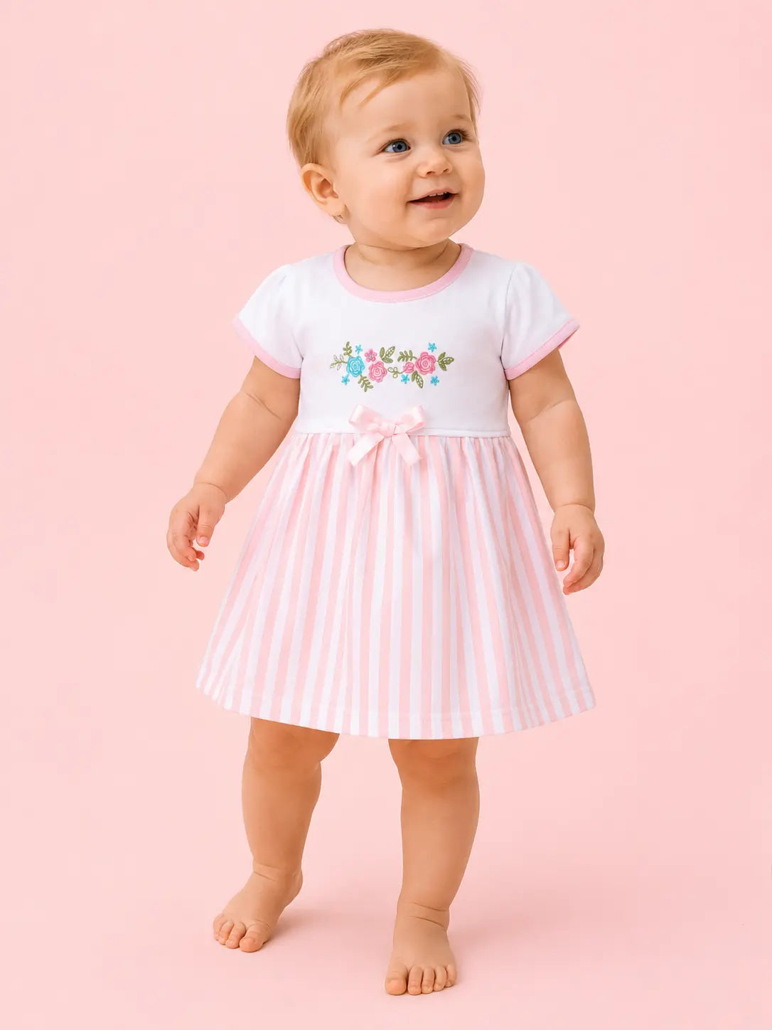 Powder Pink — Tiny Meadow organic cotton baby dress worn by baby model, soft cotton baby clothes for sensitive skin, premium baby clothes India and sustainable baby clothing India by BabyRon