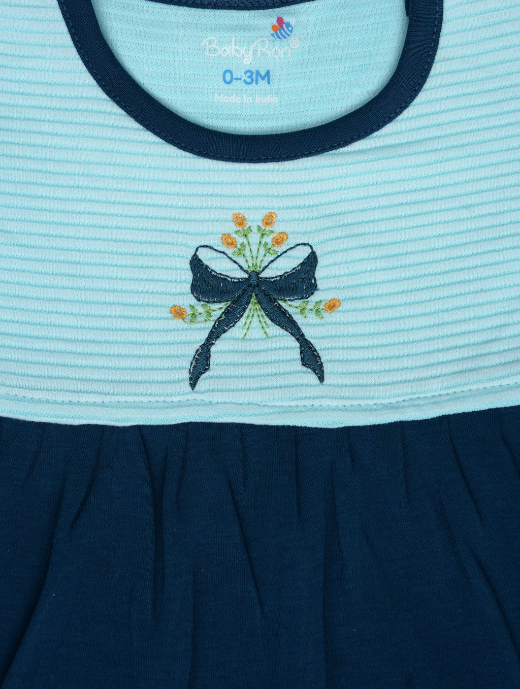 Twilight Blue — BabyRon Rosette organic cotton baby dress worn by baby model, soft cotton baby clothes for sensitive skin, premium baby clothes India and sustainable baby clothing India by BabyRon